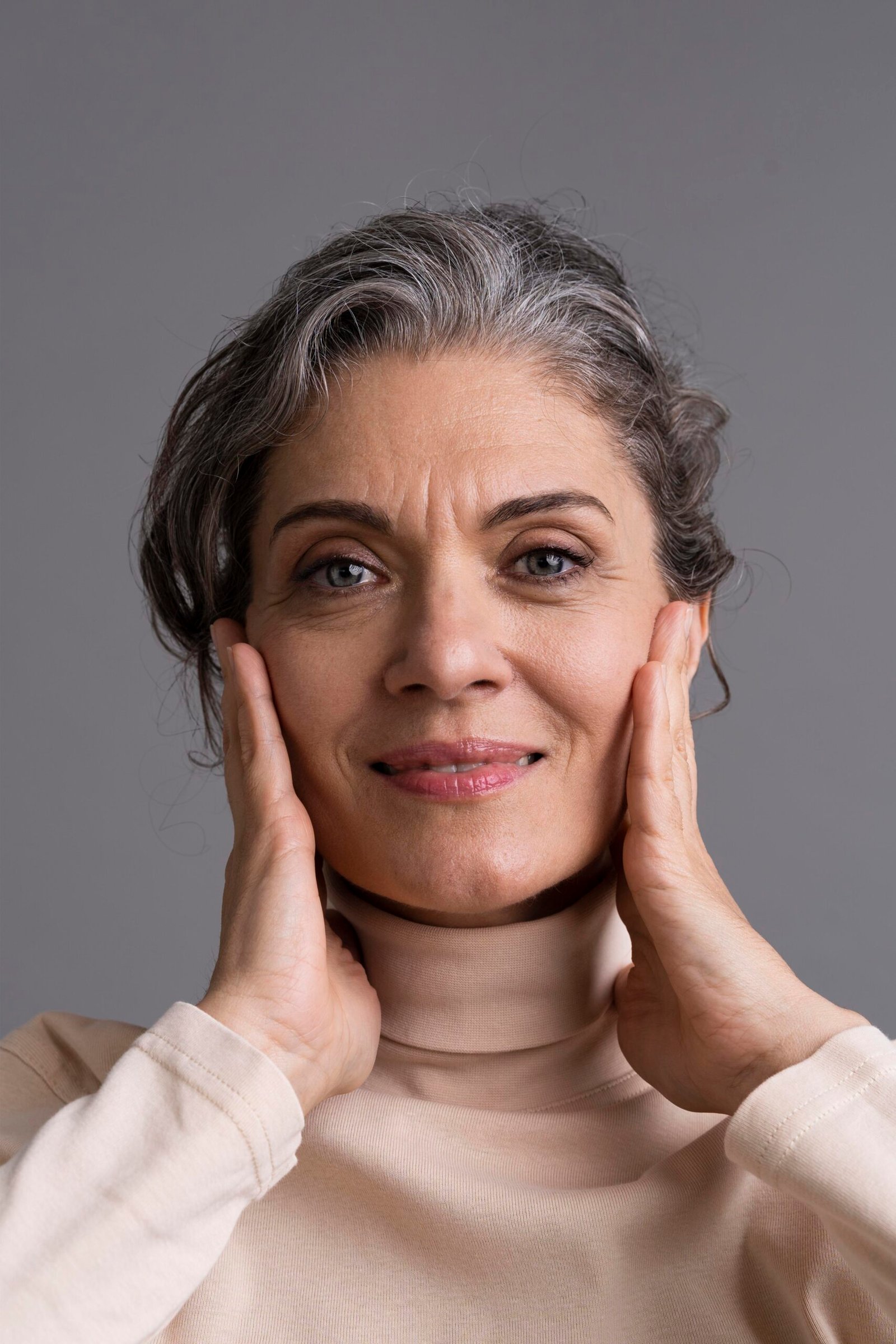 Woman with visibly smoother, radiant skin after using Kinoko Labs Anti-Wrinkle Serum